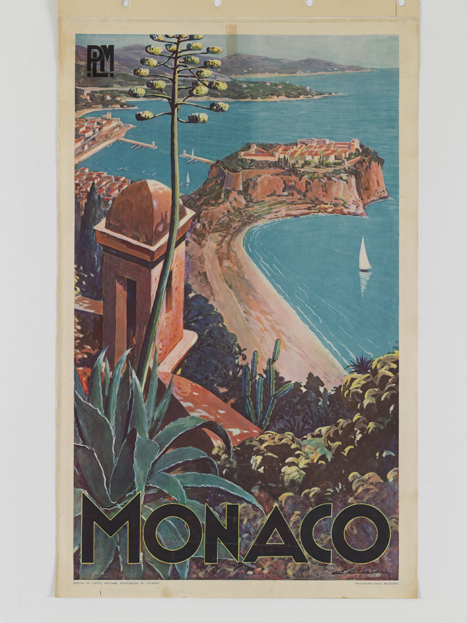 la fascia costiera di Montecarlo con un'agave fiorita (manifesto) di Clarissi E - ambito francese (sec. XX)
