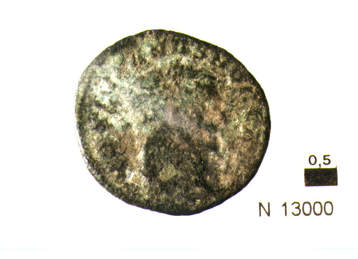 R/ testa diademata di Diocleziano (?) a destra; V/ Moneta stante a sinistra con bilancia e cornucopia; a sinistra una stella (moneta, follis) (sec. IV d.C)