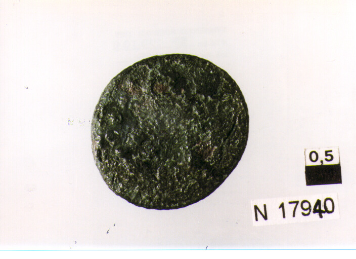 R/ testa di Minerva a destra (poco leggibile), sopra segno del valore (quattro globetti); V/ illeggibile (moneta, triente) (sec. I d.C)