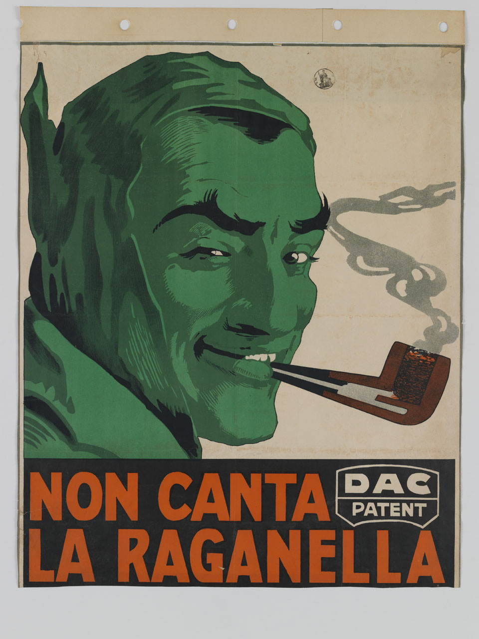 volto maschile colorato di verde con cuffia mefistofelica che fuma una pipa (manifesto) - ambito italiano (sec. XX)