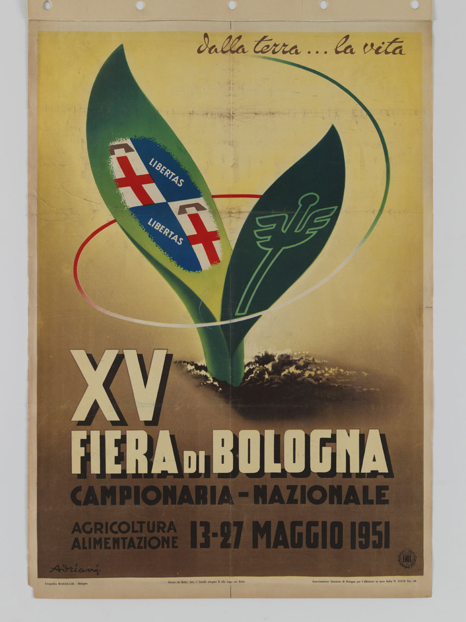 piantina che spunta dalla terra, sulle cui foglie è impresso lo stemma della città di Bologna e un marchio stilizzato (manifesto) di Adriani Emidio (sec. XX)