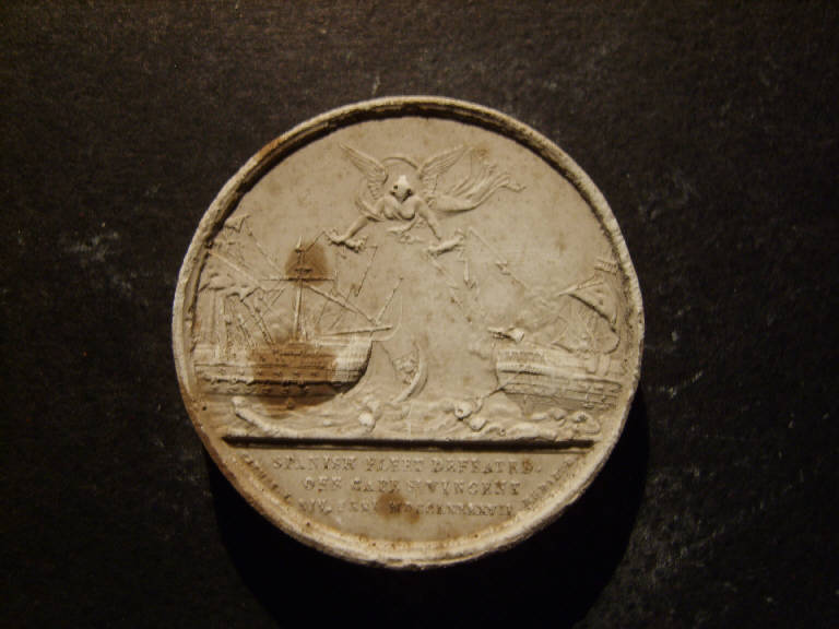 Medaglia commemorativa di Cape S.t Vincent del 1797, Allegoria della sconfitta della flotta spagnola con Vittoria alata che colpisce due navi da battaglia con fulmini (calco, opera isolata) - ambito italiano (prima metà sec. XIX)