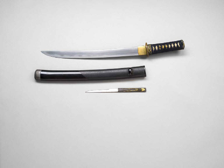 Scena di battaglia (impugnatura di spada) - manifattura giapponese (secc. XVII/ XIX)