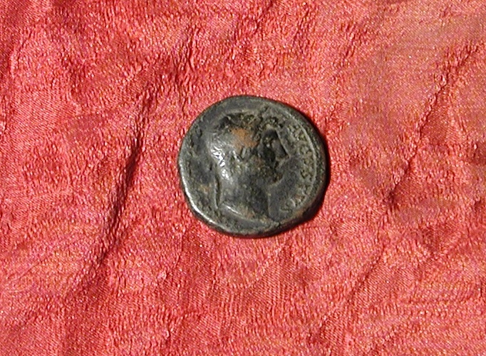 moneta - asse (?) - ambito romano (sec. II d.C)
