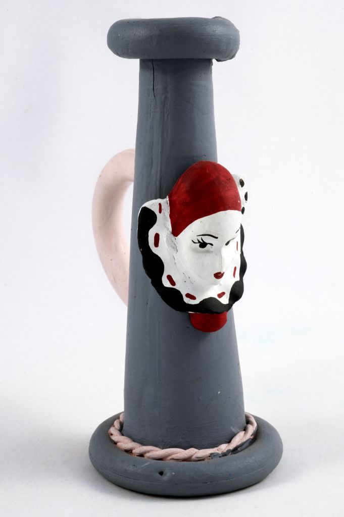 A’ Carrigg, volto su vaso cilindrico (fischietto, a fessura interna, strumenti musicali) di Diaferio Michele - laboratorio (1996)