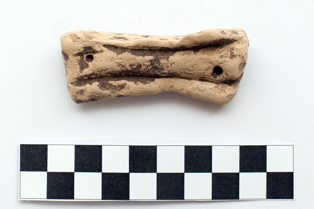 ansa / a rocchetto - Produzione di tipo Serra D’Alto-Diana (Neolitico)