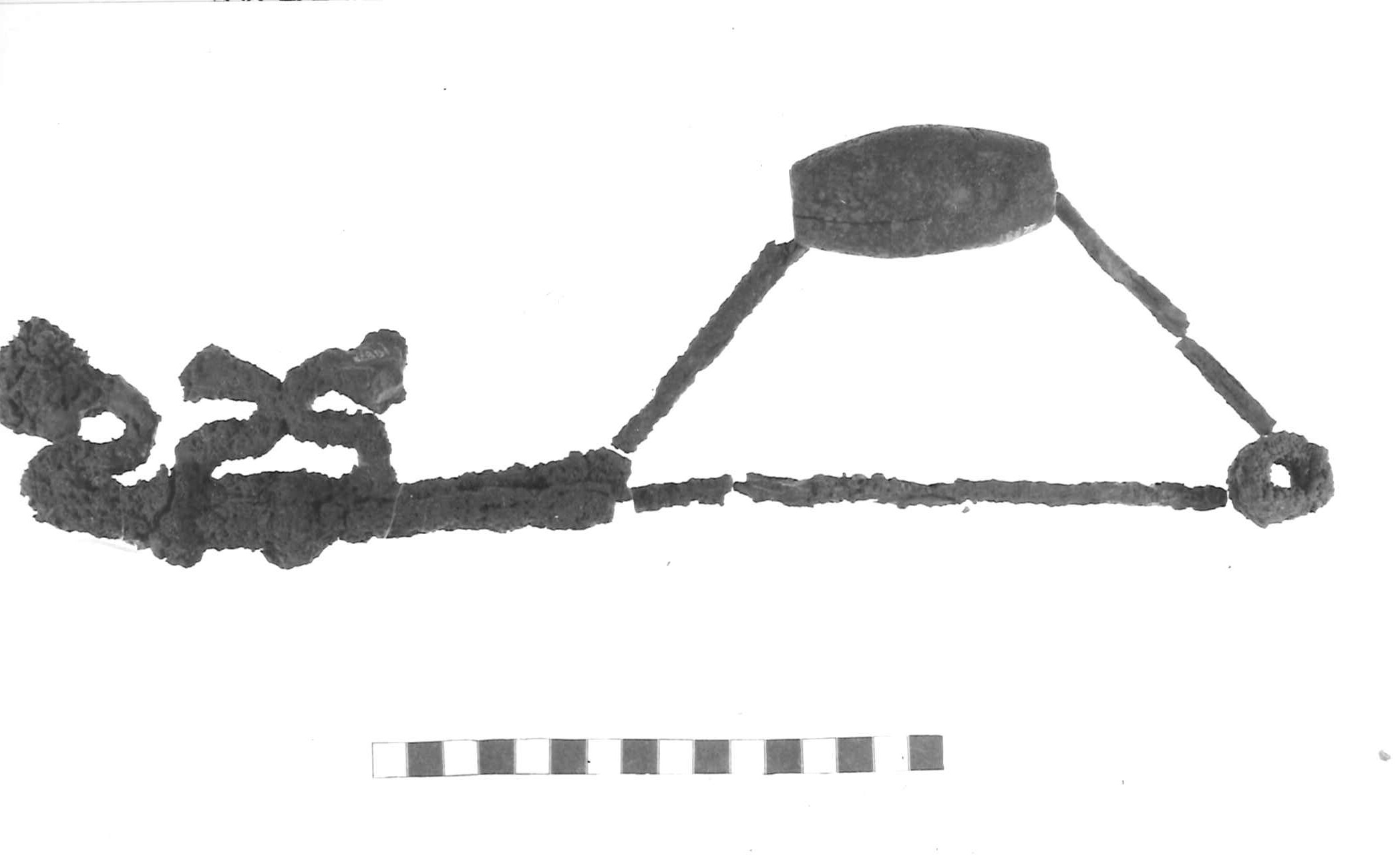fibula ad arco trapezoidale rivestito - Piceno IV A (sec. VI a.C)