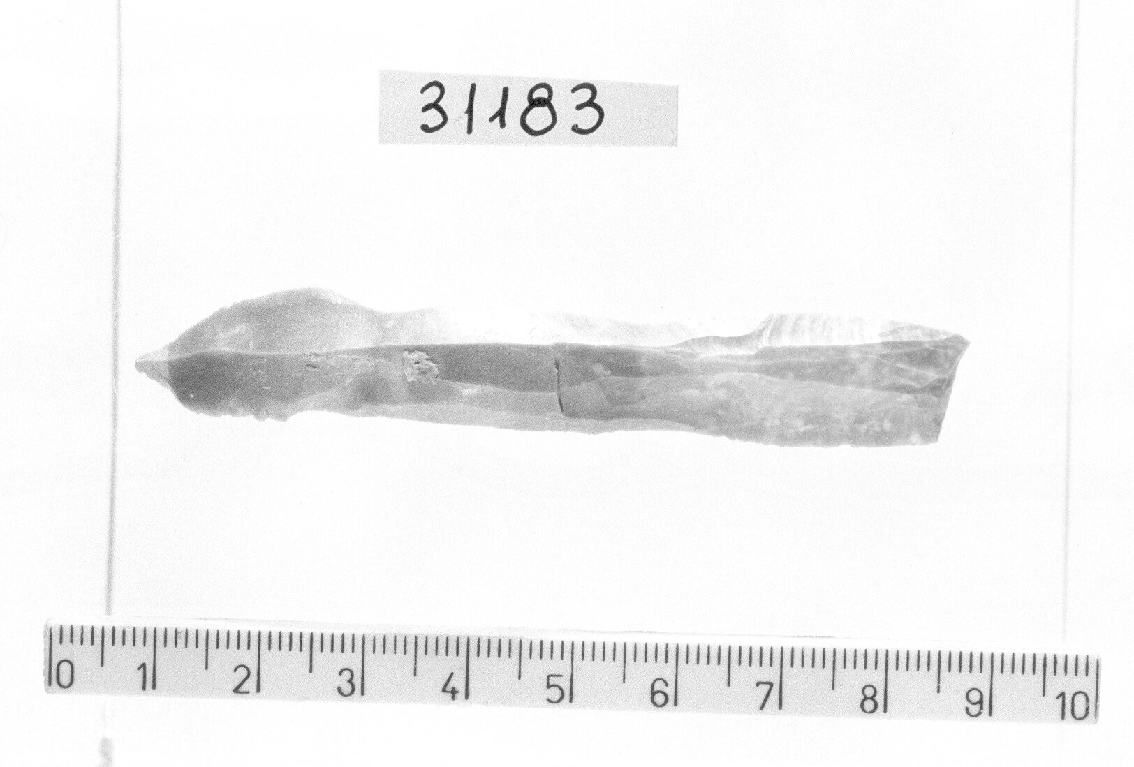 bulino a stacco laterale su troncatura obliqua - Gravettiano (Paleolitico superiore)