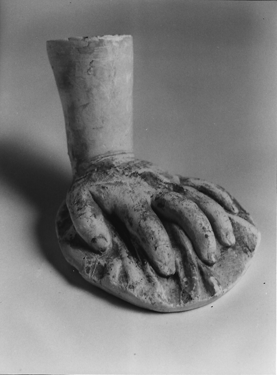 mano sinistra (calco, serie) - produzione coreglina (fine sec. XIX)
