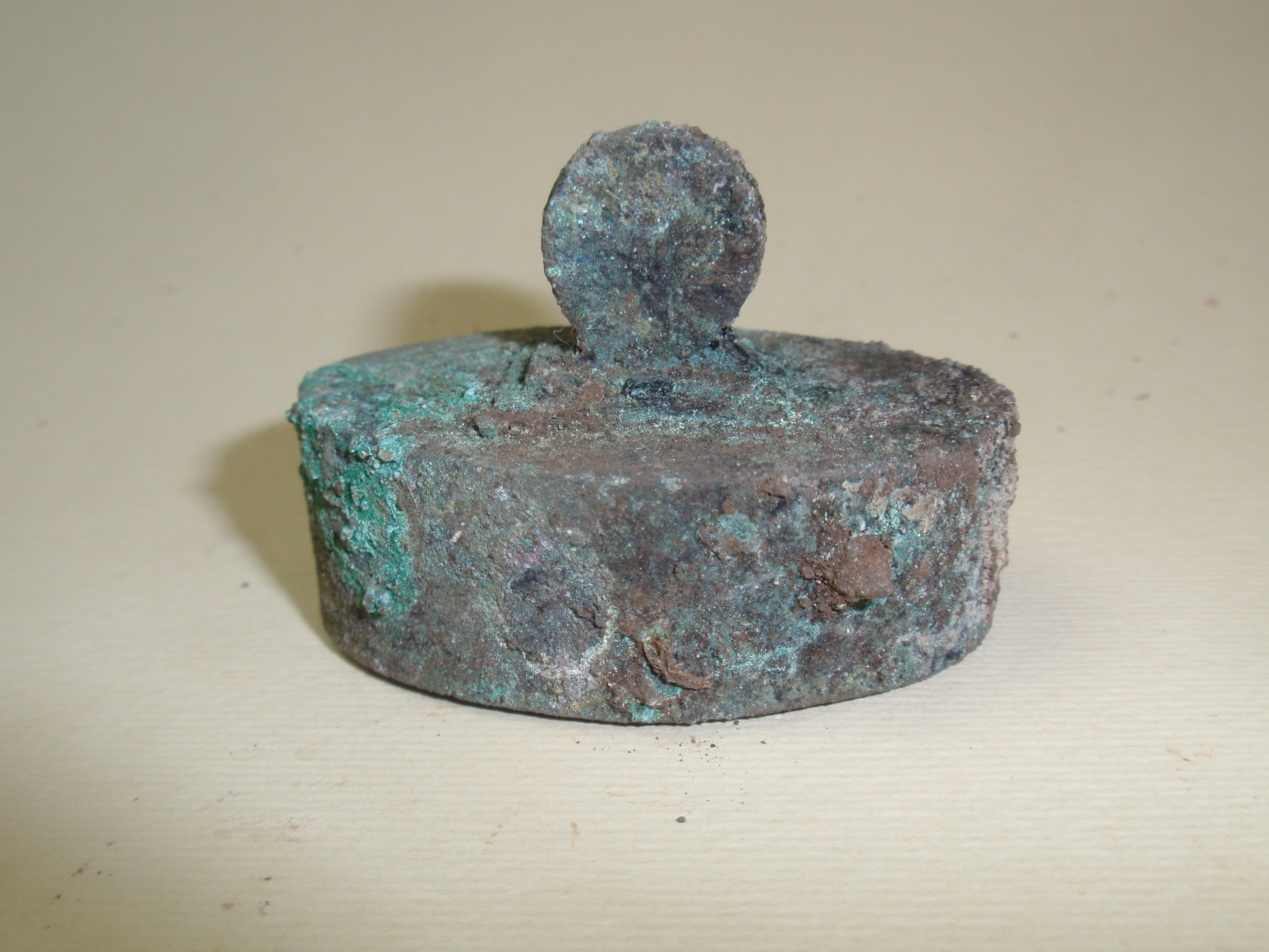 peso, in bronzo a sezione ovale (seconda metà III a.C)