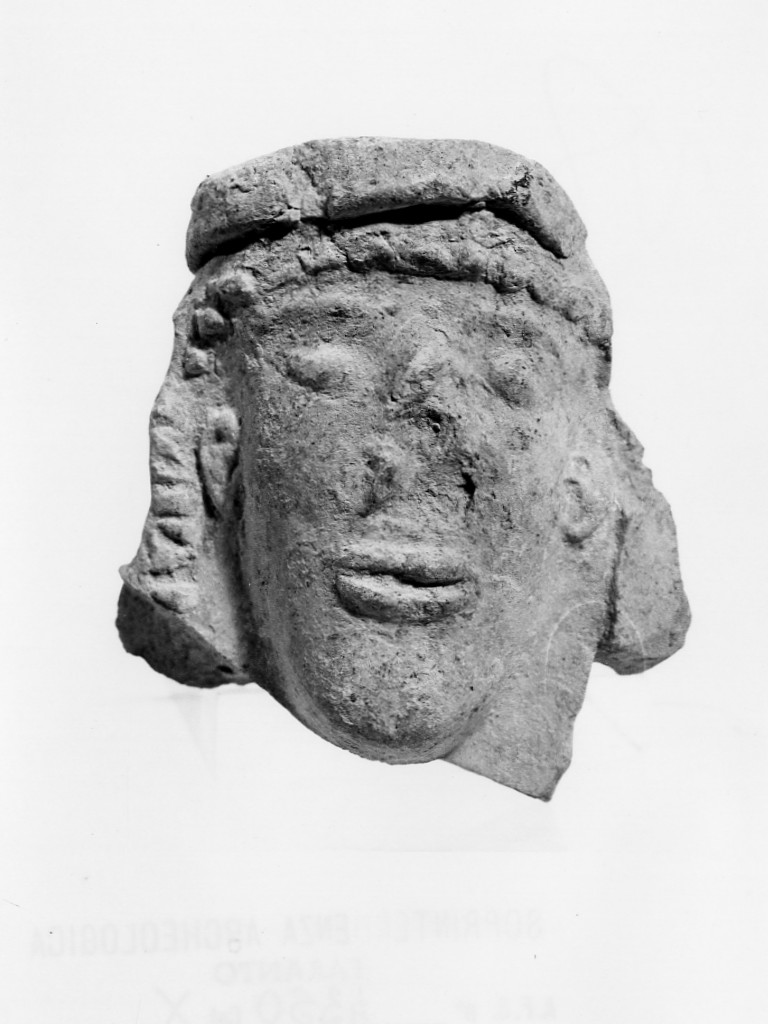 kouros (testa maschile) - fabbrica locale (sec. VII a.C)