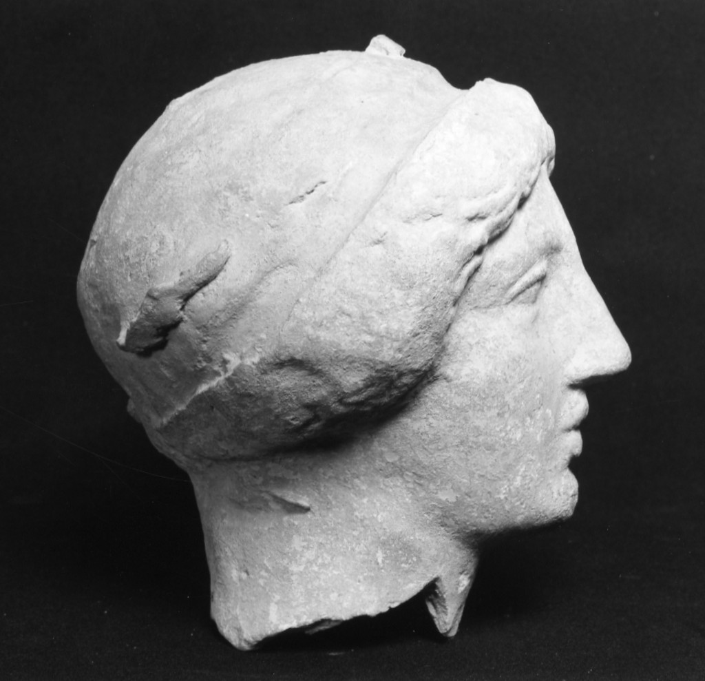 testa femminile - officina tarantina (fine/ inizio secc. V a.C.-IV a.C)