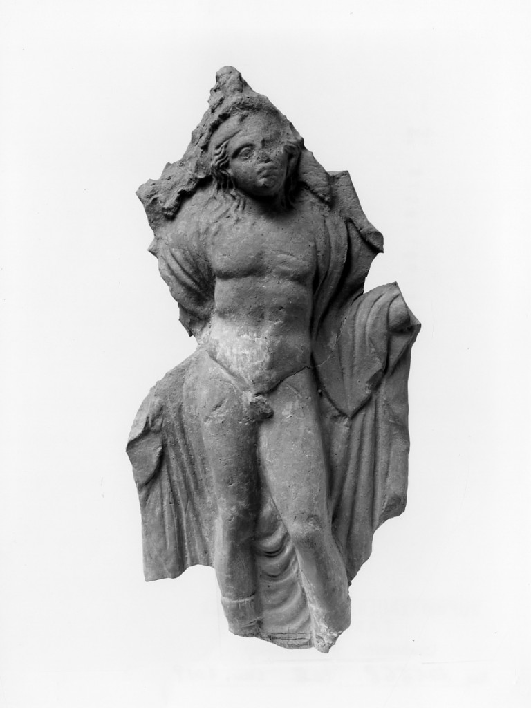 figura maschile stante (terracotta figurata) - officina tarantina (sec. IV a.C)