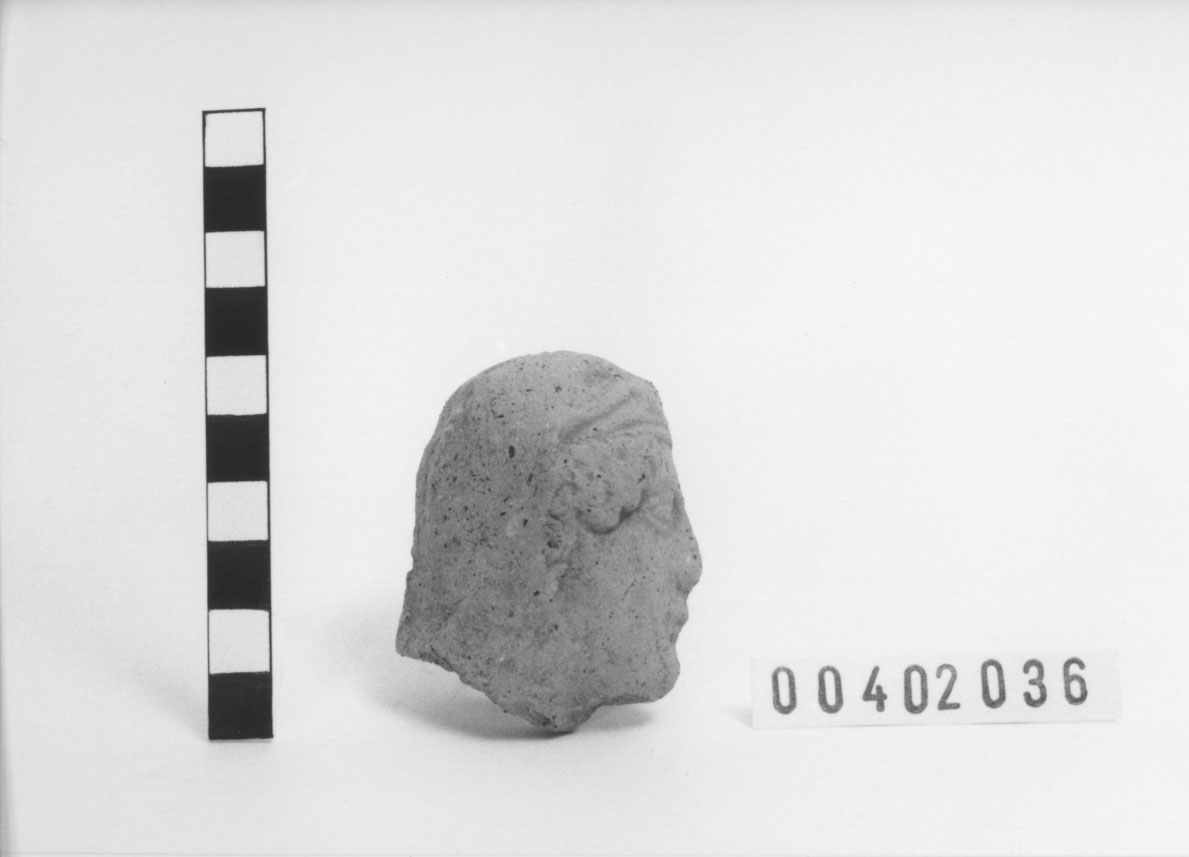 Figura femminile (Mezza testa votiva) (IV a.C, III a.C)