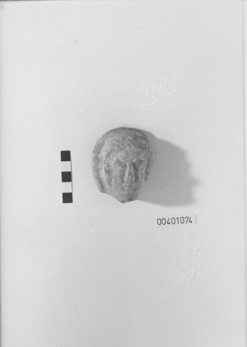 testa/ votiva, maschile - produzione locale (IV-III a.C)