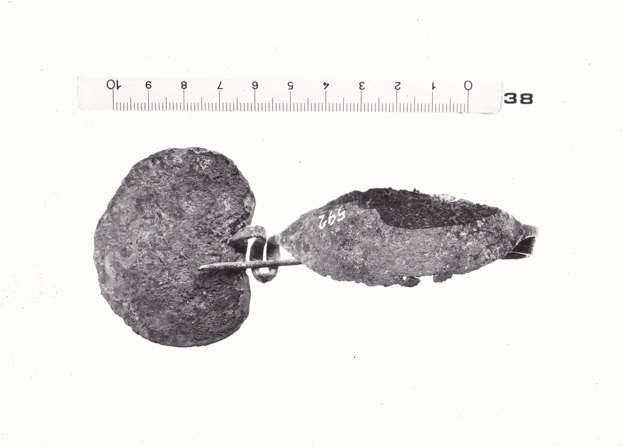 Fibula con arco foliato con staffa a disco - FASE TERNI II (inizio Età del ferro I)
