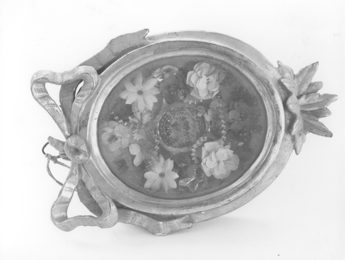 reliquiario a capsula - a medaglione - bottega toscana (fine/ inizio secc. XVIII/ XIX)