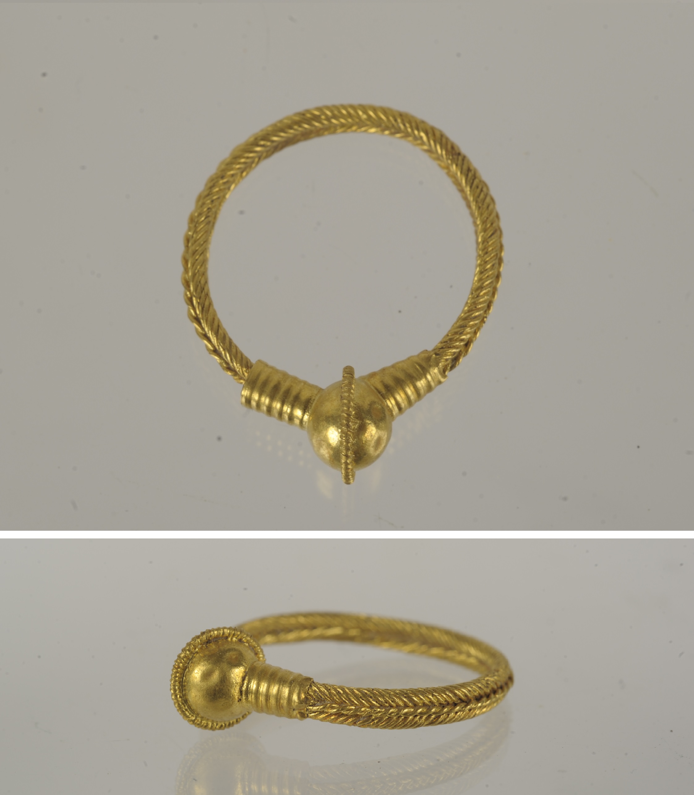 orecchino - produzione etrusco-adriese (secc. IV/ III a.C)