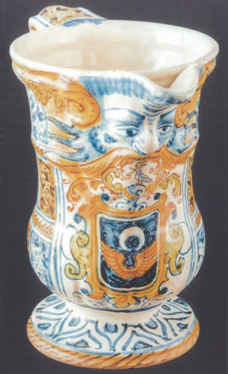 stemma e mascherone con motivi decorativi geometrici e vegetali (versatoio, opera isolata) - bottega di Castelli (primo quarto XVII)