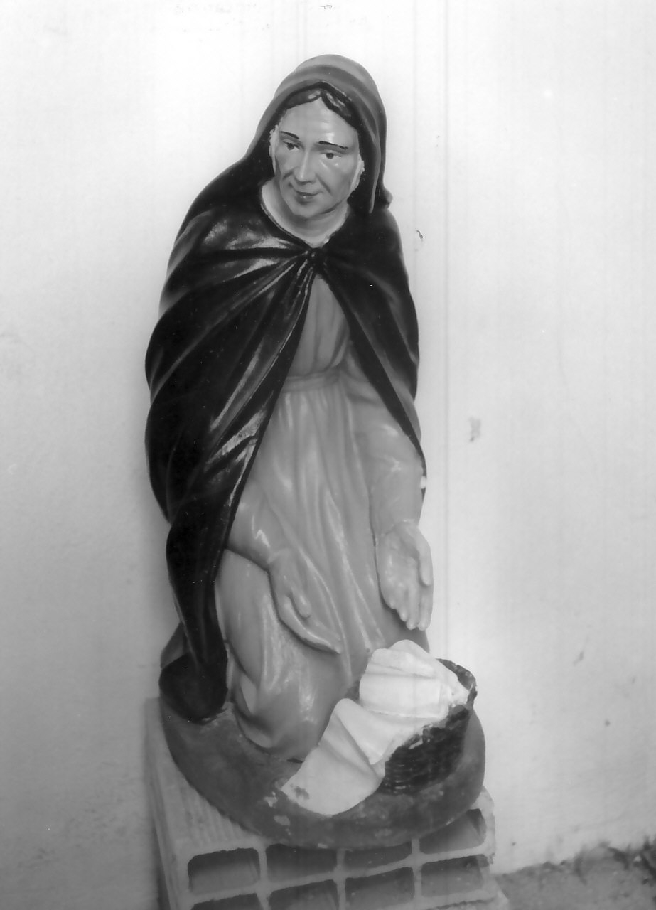 donna con cesta e panni (statuetta di presepio, elemento d'insieme) - bottega calabrese (fine/inizio secc. XIX/ XX)