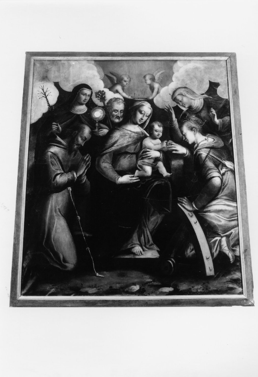 Sacra Famiglia con San Francesco d'Assisi, Santa Chiara, Santa Caterina d'Alessandria e monaca benedettina (dipinto) - ambito emiliano-romagnolo (prima metà sec. XVIII)