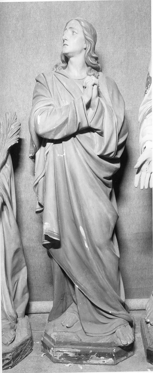 San Giovanni Evangelista (statua, elemento d'insieme) di Righetti Emilio (sec. XX)