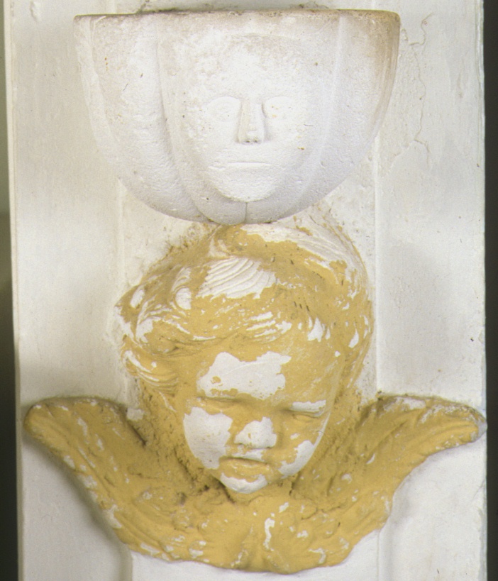 testa angelica (rilievo, serie) - ambito marchigiano (prima metà sec. XIX)