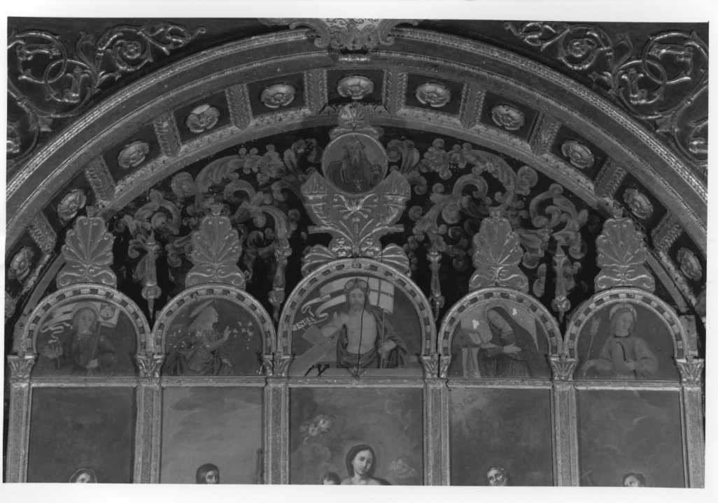Annunciazione, Cristo risorto, San Secondo, San Sebastiano e Dio Padre (cimasa) - ambito umbro (fine/inizio secc. XV/ XVI)