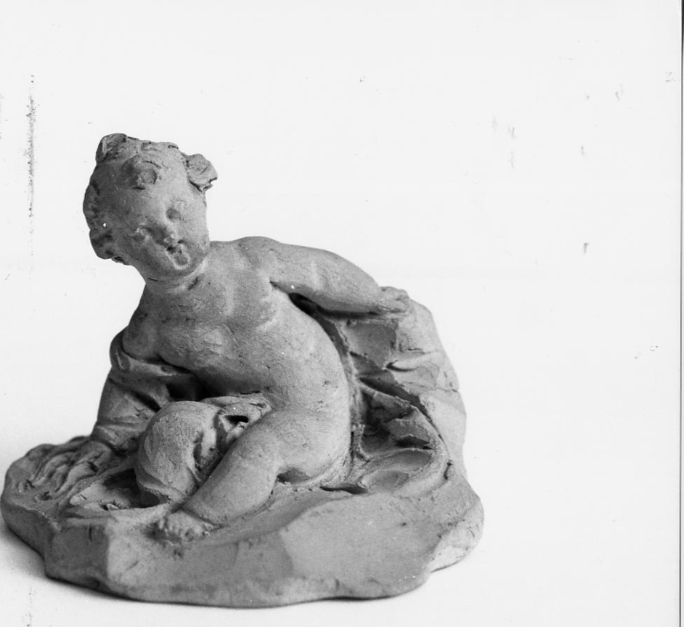putto seduto (scultura) di Paci Emidio (sec. XIX)