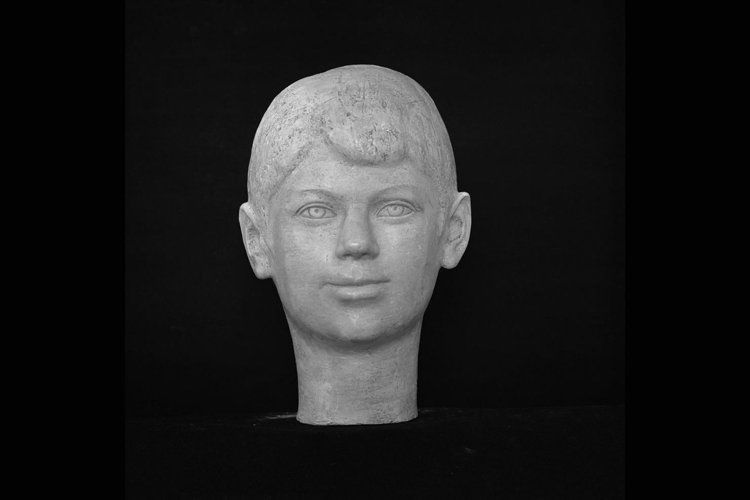 testa di fanciullo (scultura) di Gera Uno (sec. XX)