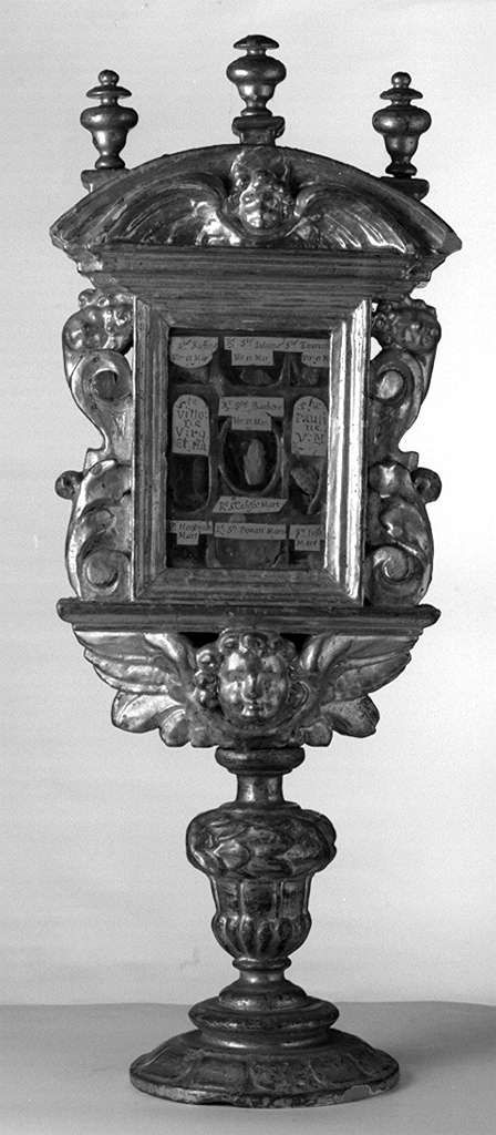 cherubini e motivi decorativi a volute (reliquiario - a tabella, serie) - bottega toscana (prima metà sec. XVII)