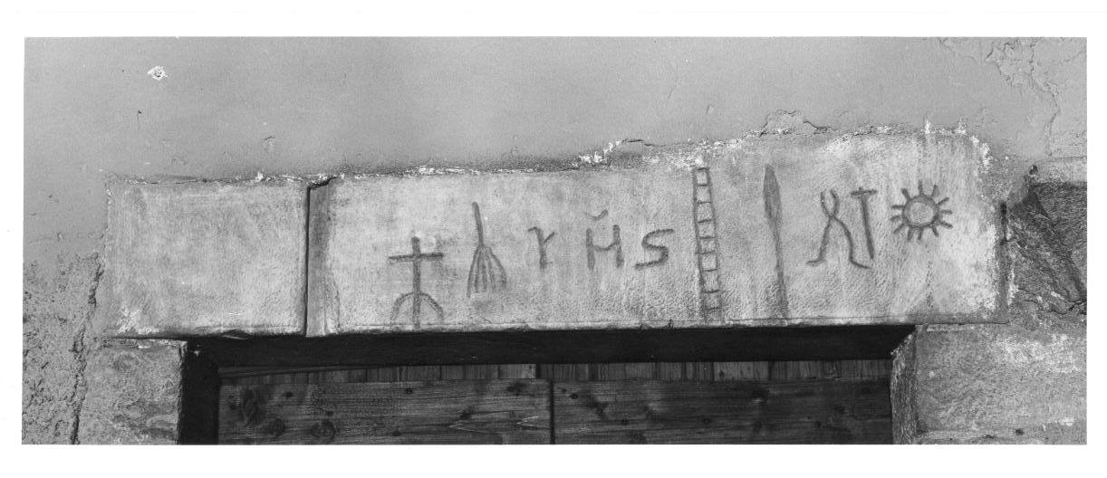 simboli della passione (architrave di porta) - bottega umbra (sec. XII)