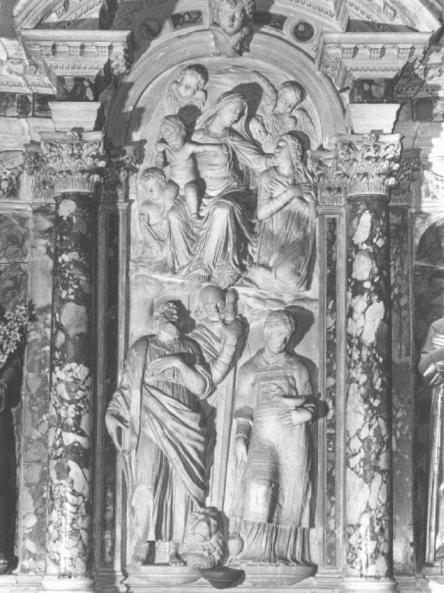 Madonna con Bambino tra santi (rilievo) di Cavrioli Francesco (attribuito) (sec. XVII)