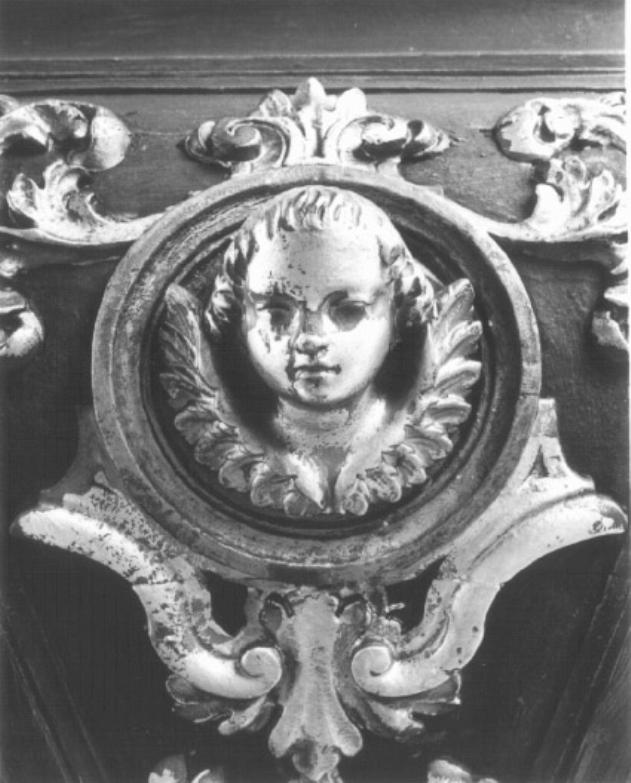 testa di cherubino in clipeo/ motivi decorativi vegetali (decorazione plastica) - ambito veneto (prima metà sec. XIX)