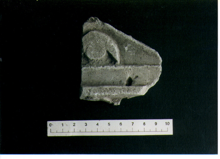 STELE VOTIVA/ FRAMMENTO - CIVILTA' PUNICA (SEC. III A.C)