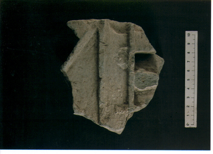 FIGURA UMANA (STELE VOTIVA/ FRAMMENTO) - CIVILTA' PUNICA (SEC. III A.C)