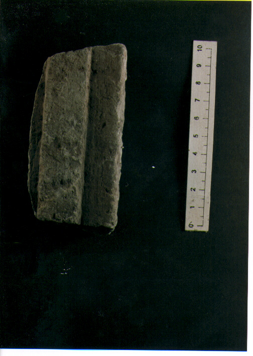 STELE VOTIVA/ FRAMMENTO - CIVILTA' PUNICA (secc. IV/ III a.C)