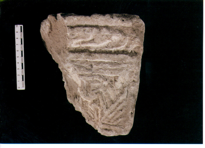 STELE VOTIVA/ FRAMMENTO - CIVILTA' PUNICA (secc. V/ IV a.C)