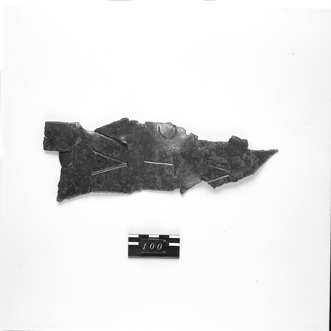 Lastra bronzea iscritta/ frammento (Età romana)