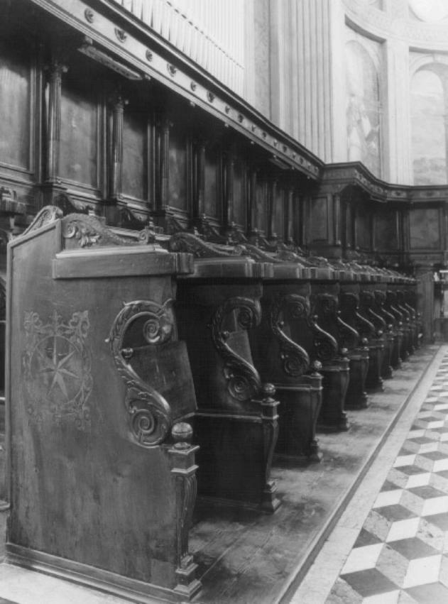 Motivi decorativi fitomorfi e teste alate (stallo del coro) di Manetti Giovanni detto Fiorentino (sec. XVI)