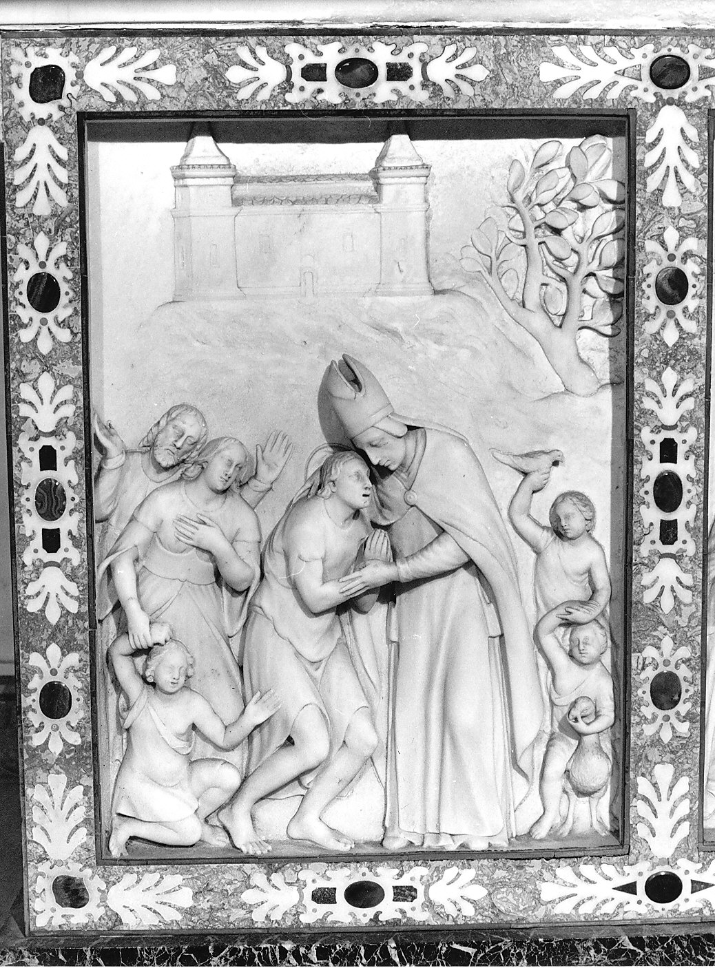 S. Ugone benedice un gruppo di lebbrosi (rilievo, elemento d'insieme) di Orsolino Tommaso (sec. XVII)