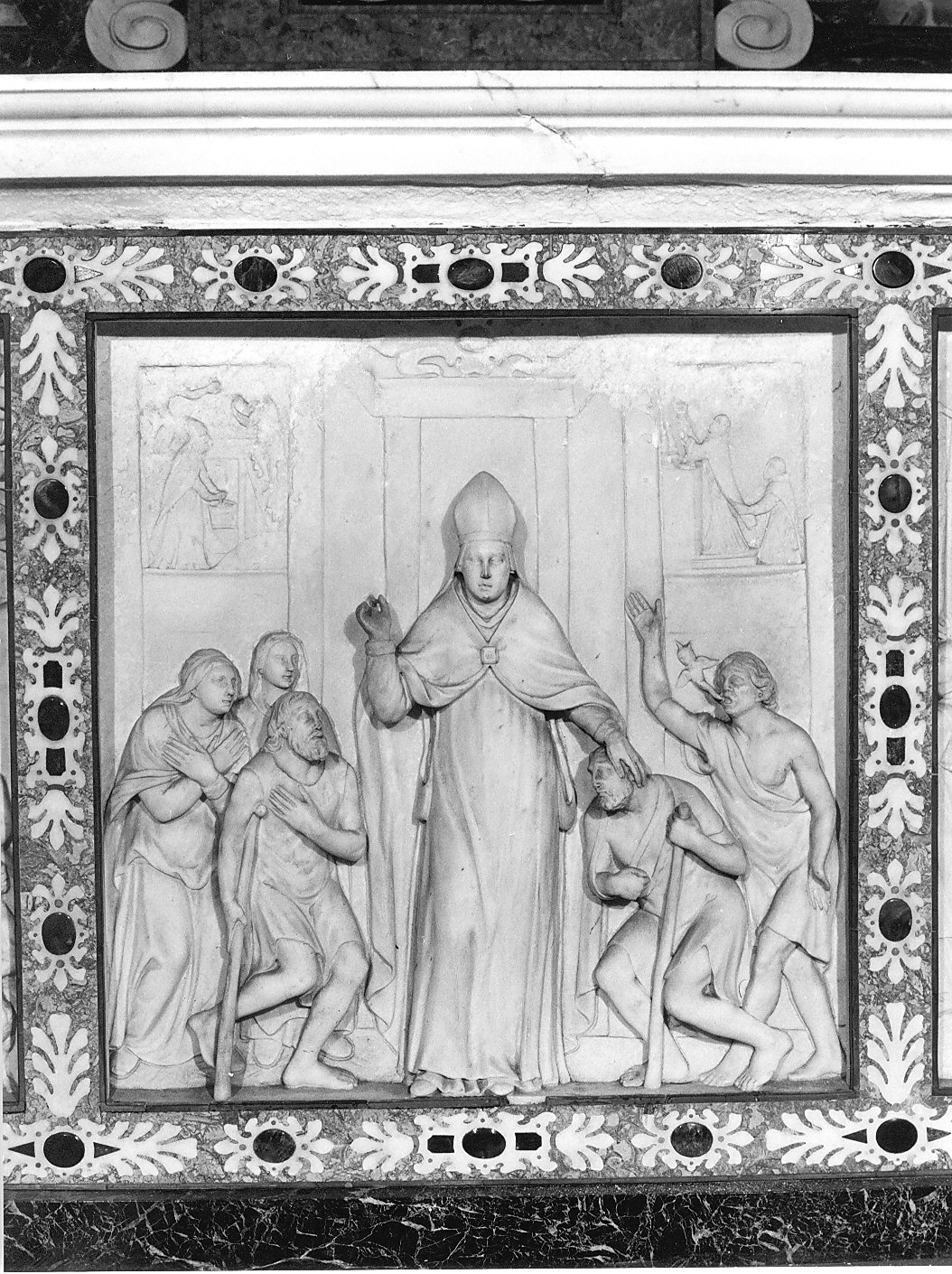 S. Ugone fa elemosina ai poveri (rilievo, elemento d'insieme) di Orsolino Tommaso (sec. XVII)