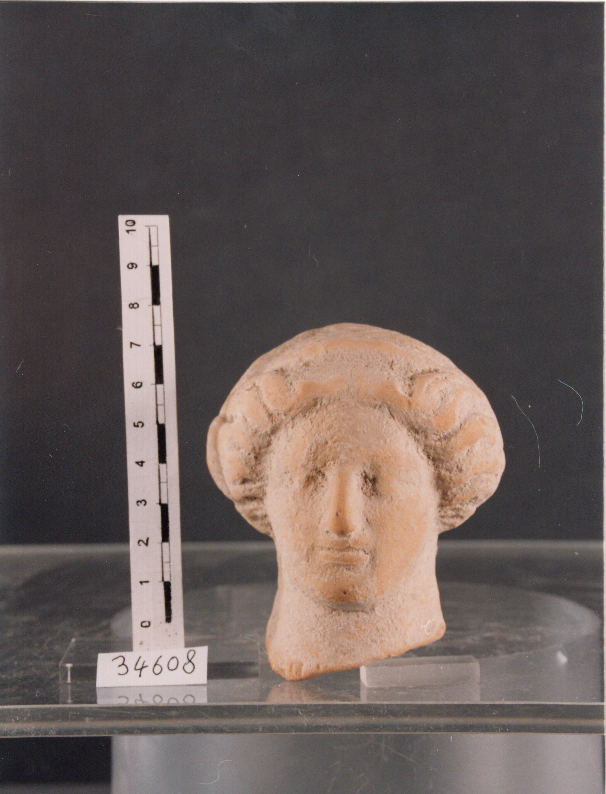 testa femminile (placchetta) - civiltà punico-romana (Età punico-romana)