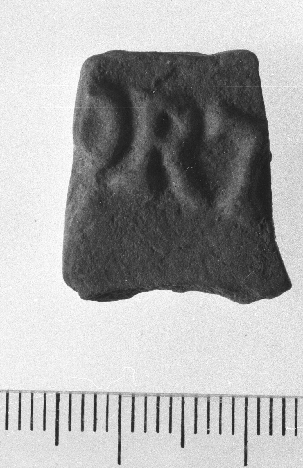 fondo di lucerna/frammento, tipo Firmalampe (secc. I - II d.C)