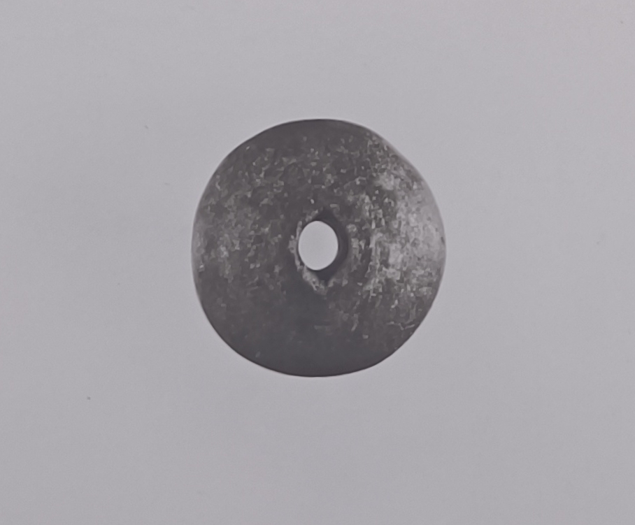 fuseruola/ a superficie liscia (SECOLI/ ARCHI DI SECOLI/ VII-VI a.C)