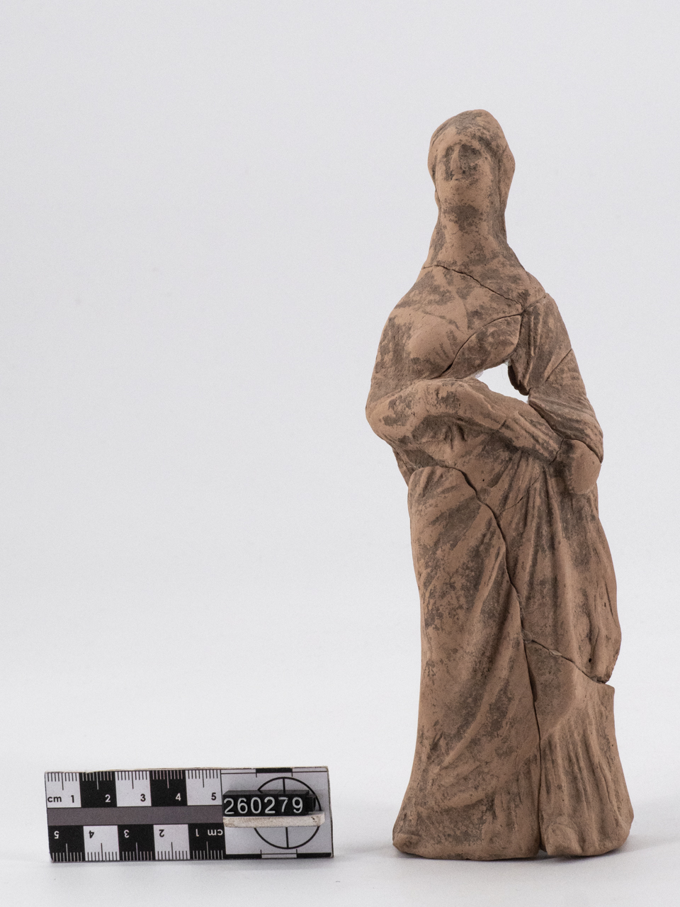 statuetta/ femminile, stante, panneggiata - lucana (IV a.C.-III a.C)