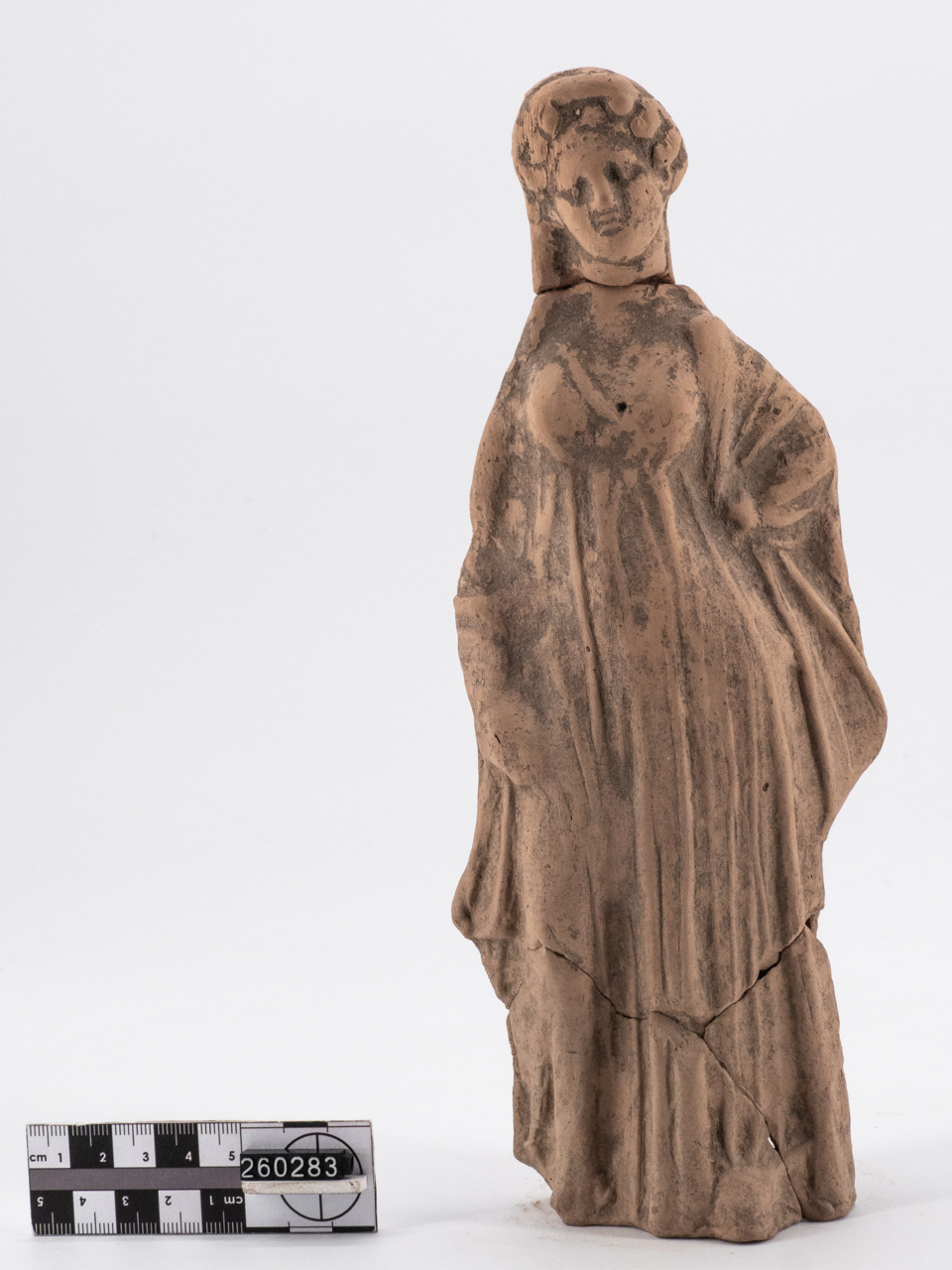 statuetta/ femminile, stante, panneggiata - lucana (IV a.C.-III a.C)