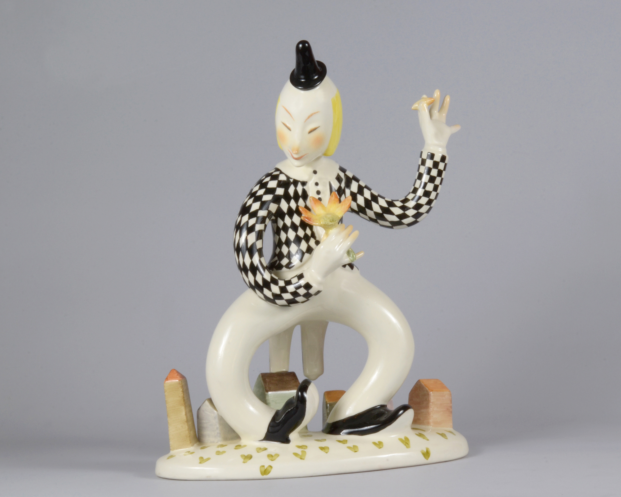 Dimmi di sì, uomo con fiore (scultura) di Sturani Mario, Fabbrica Lenci (anni trenta sec. XX)