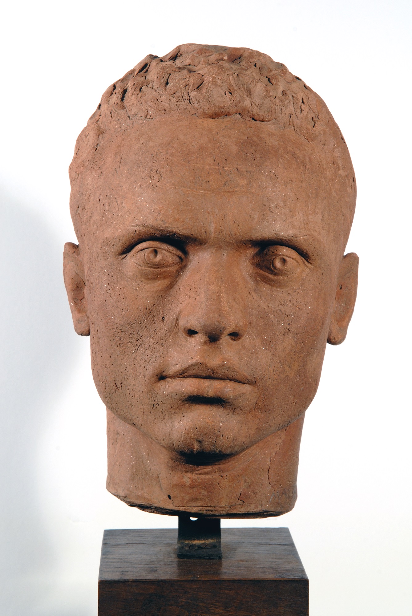 Testa di giovinetto, Ritratto di giovane uomo (scultura) di Mastroianni Umberto (anni quaranta sec. XX)