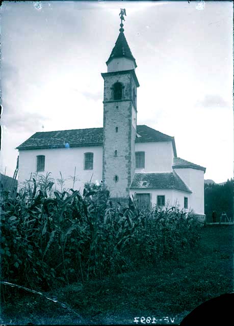 Veduta: esterno, fiancata; abside; campanile (negativo) di Caprioli, Giovanni (inizio XX)